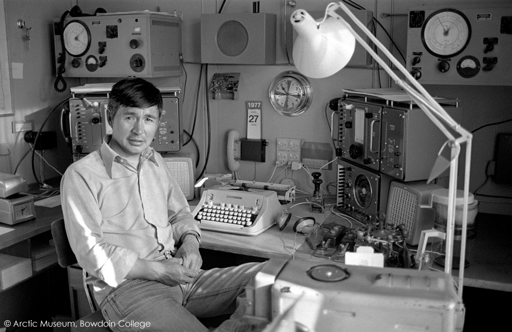 Radio operator, Paul Ib, sits by his equipment in the radio station at Qaanaaq. Northwest Greenland. 1977